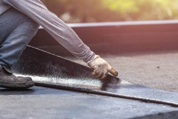 Professional Basement Waterproofing technician working in Fort Campbell, KY